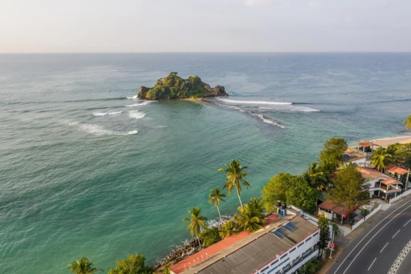 Beautiful sandy beach on a tropical island. Pigeon Island, Sri Lanka.
