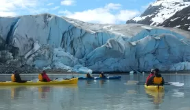 Kayaking close to glaciers