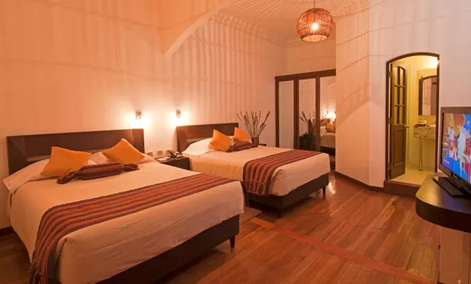 Parquet floors and gabled roofs are the setting for comfortable accommodations