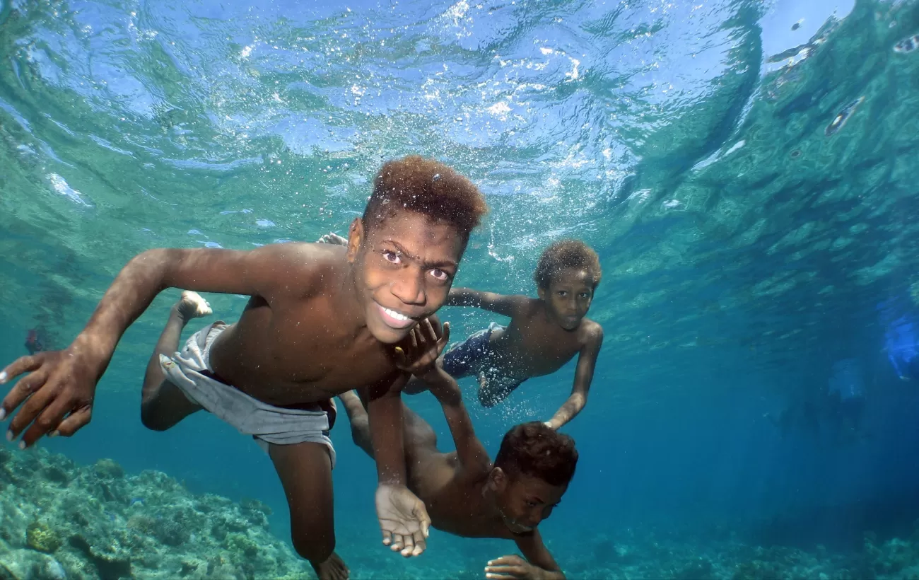 Local children taking a swim