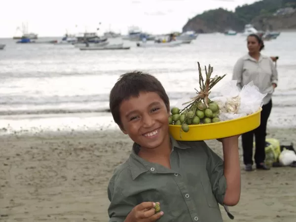 Young boy in Nicaragua eager to sell you something to eat!