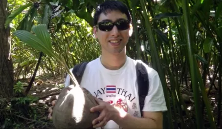 Andy poses with a found coconut