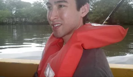Safety first, Andy wears a required life vest 