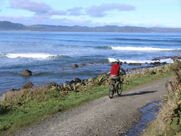Enjoy a bike ride along the coast during your Chiloe Island Adventure