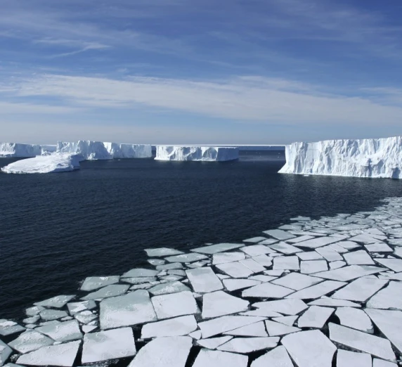 Ross Sea, Antarctica - Aerial View with Pack Ice and Icebergs.