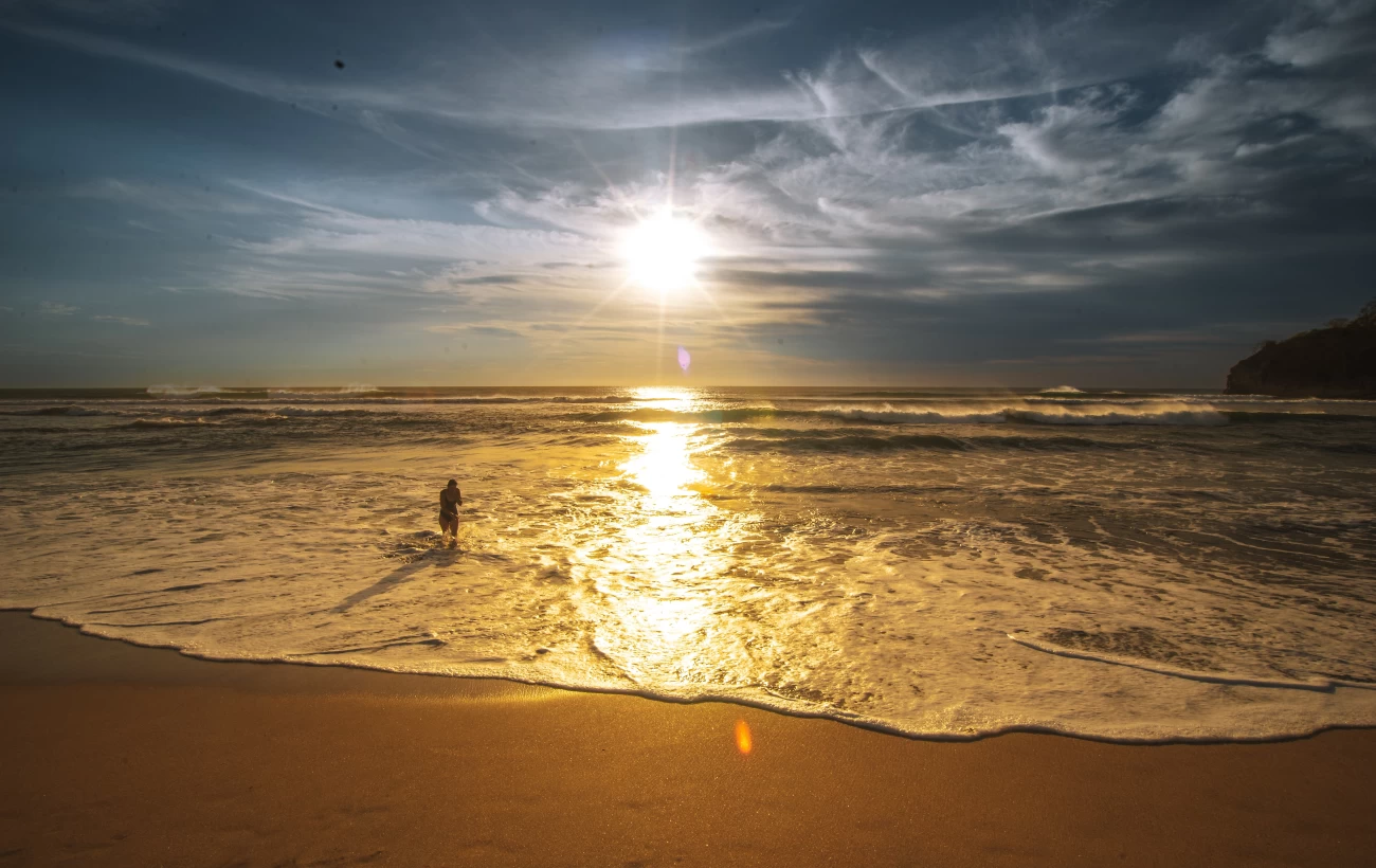 Sun setting at beach in Nosara, Costa Rica
