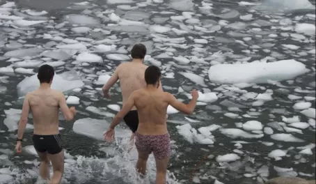 An icy dip...these guys are NUTS!