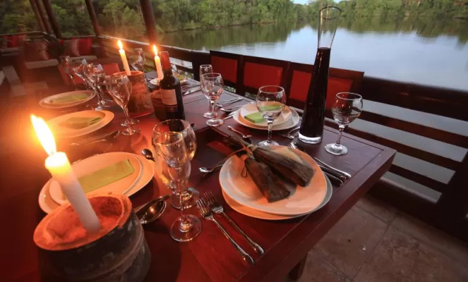 Enjoy locally sourced meals combined with stunning views of the lake at Selva Lodge