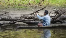 Fisherman: a stick, a wire, & bait