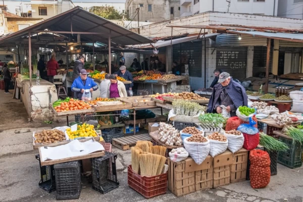 local market in Albania with seasonal vegetables on display