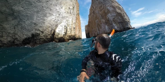 Visit Kicker Rock, popularly known as the Sleeping Lion (Leon Dormido)