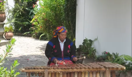 A local plays music in Guatemala