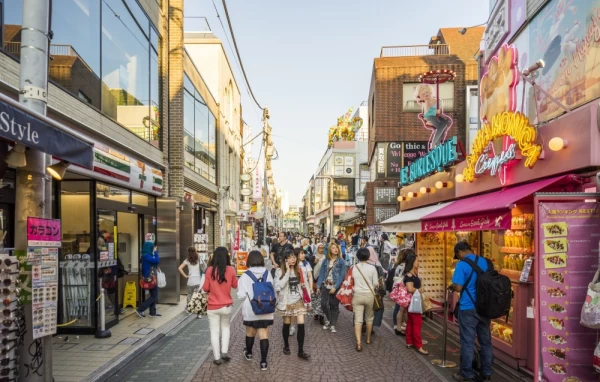 Crowded Takeshita shopping street in Harajuku fashion district.