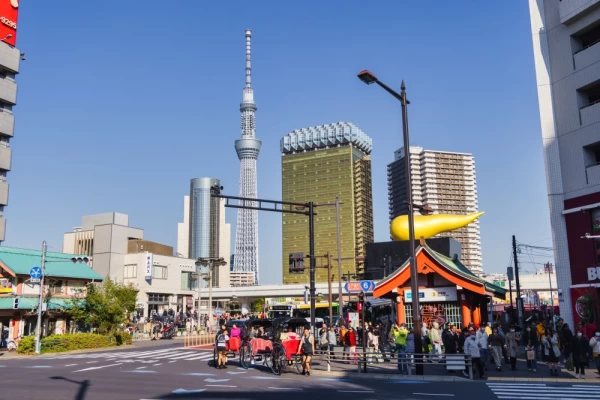 Street view from Asakusa to the Sumida skyline, Tokyo skytree and the Asahi Beer hall
