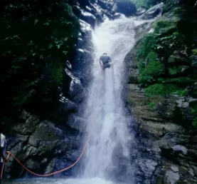 Rapelling upt he waterfall in Costa Rica
