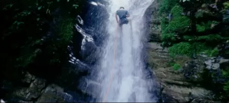 Rapelling upt he waterfall in Costa Rica