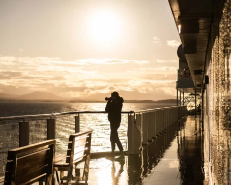 A photographer taking stunning views of Patagonia aboard the ship National Geographic Resolution