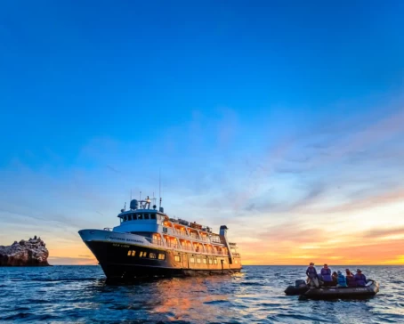 Guests explore by zodiac at sunrise from the ship National Geographic Sea Lion, Isla Espíritu Santo