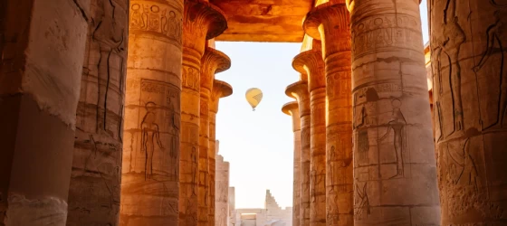 Balloons take to the sky at dawn above Pharaoh Ramesses II memorial temple in Theban Necropolis, Upper Egypt