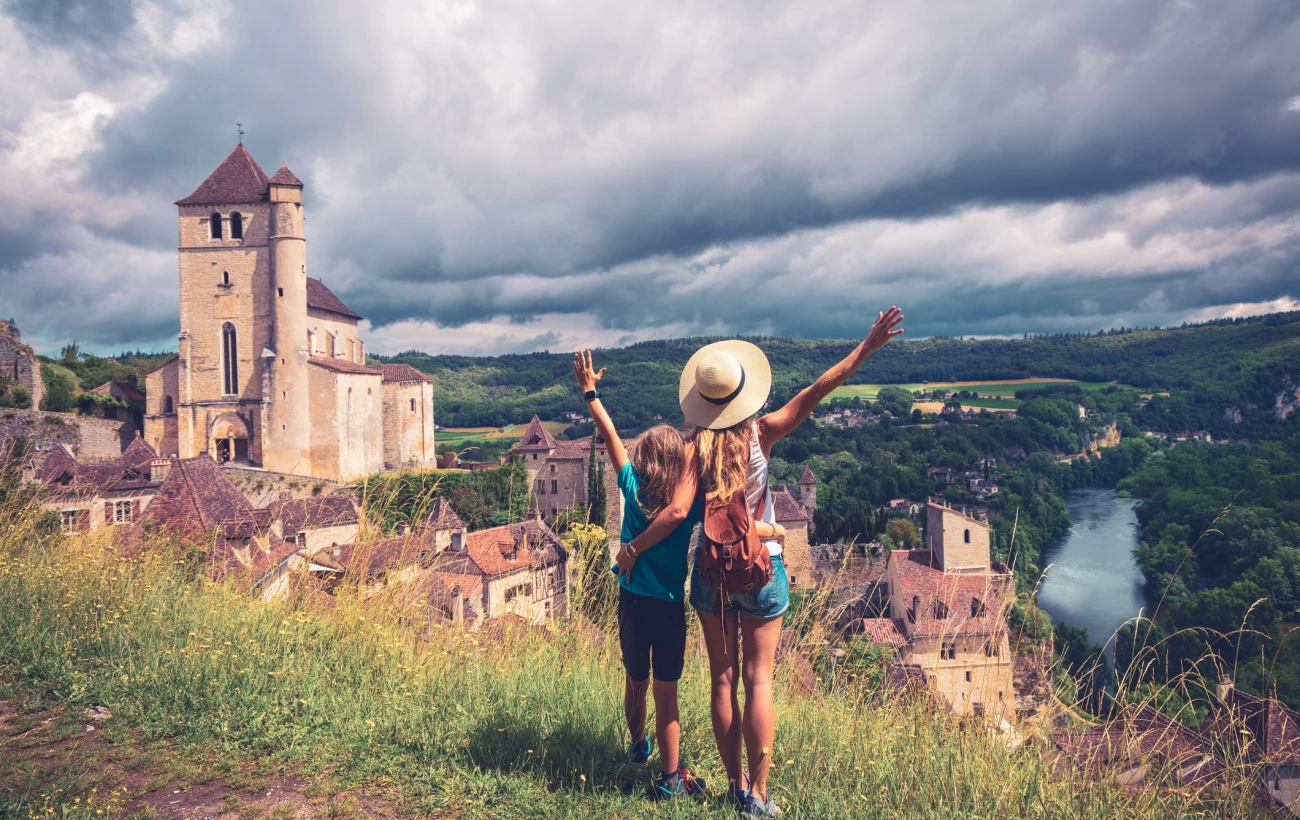 Family traveling in Saint cirq lapopie, Lot, Occitanie, France