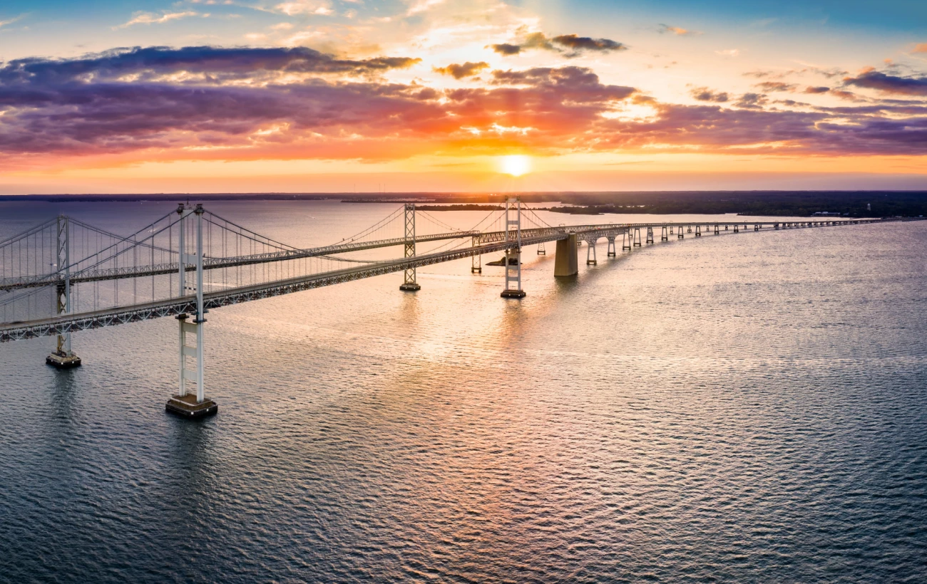 Sunset casts a golden glow over Maryland’s Chesapeake Bay Bridge