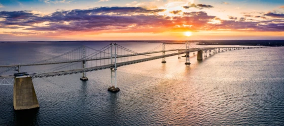 Sunset casts a golden glow over Maryland’s Chesapeake Bay Bridge