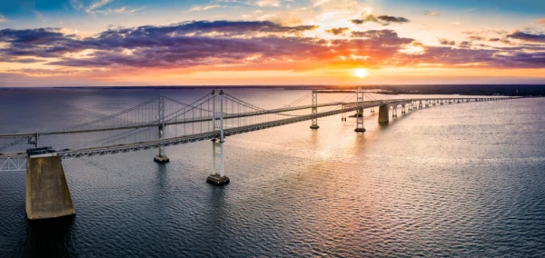 Sunset casts a golden glow over Maryland’s Chesapeake Bay Bridge