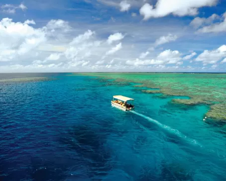 Take a glass-bottomed boat through the Great Barrier Reef.