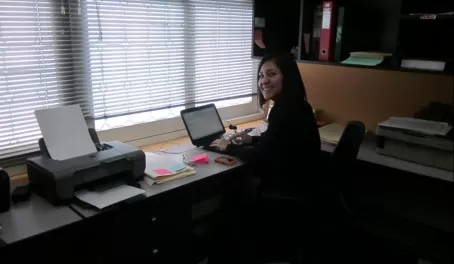 Fabi at her desk