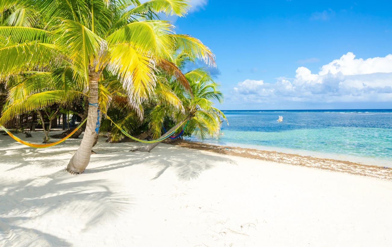 Turquoise waters and white sands at Turneffe Atoll