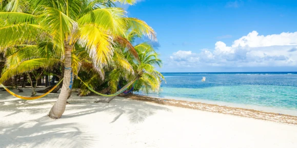 Turquoise waters and white sands at Turneffe Atoll