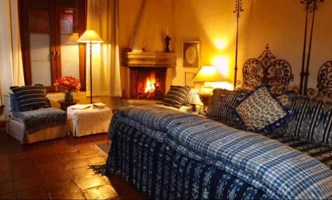 Cozy room with fireplace at Posada del Angel