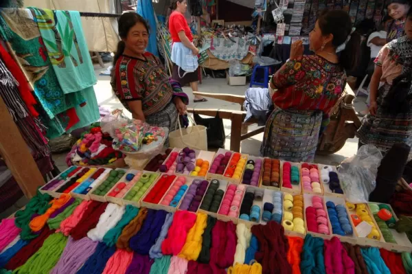Delightful smiles from vendors at Comalapa Market in Guatemala