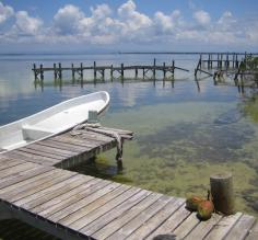 A panga rests docked on Ambergris Caye