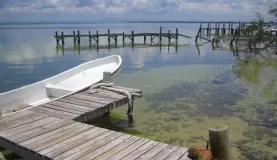 A panga rests docked on Ambergris Caye