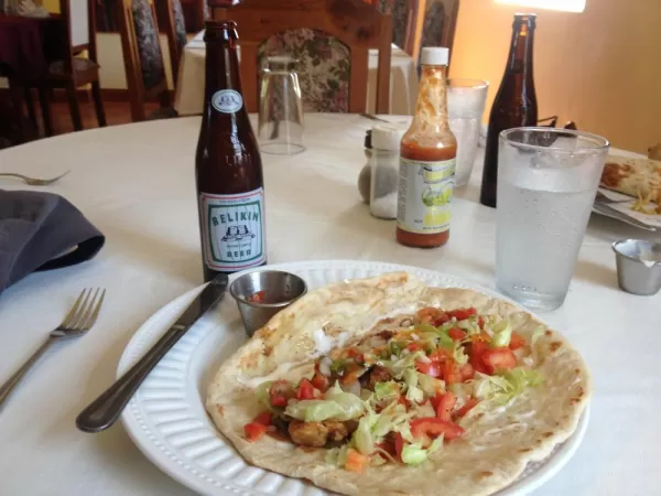 Shrimp fajitas and a cold Belikin for lunch in Placencia