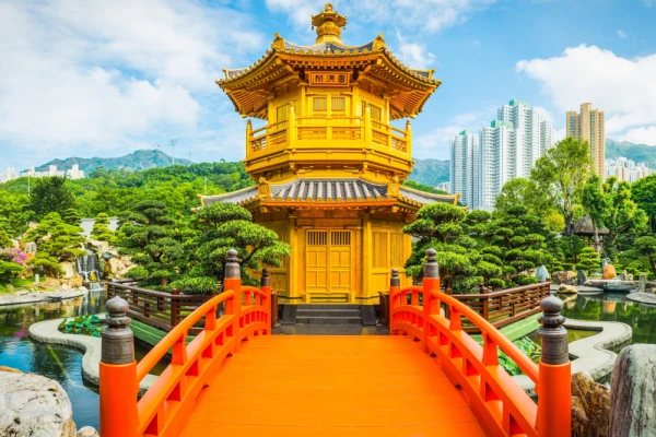 Hong Kong golden pagoda Nan Lian gardens beneath skyscrapers