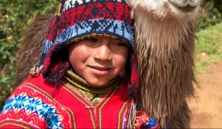 Quetchua boy with his llama