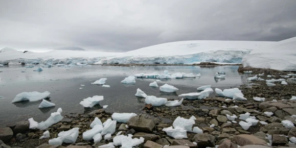 A dramatic panorama of snow, glaciers, and icebergs at Portal Point.