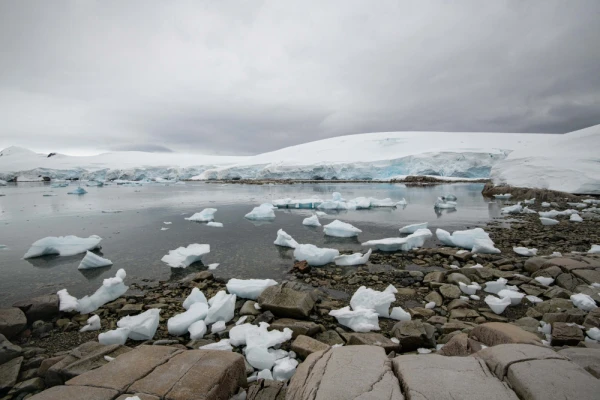 A dramatic panorama of snow, glaciers, and icebergs at Portal Point.