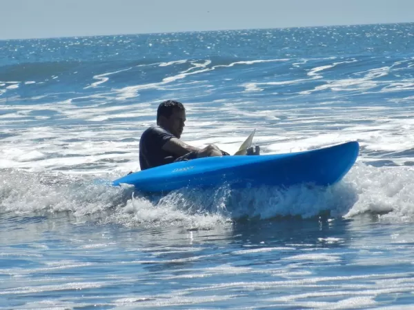 Kayaking in the ocean.