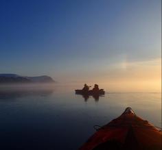 Sunset while kayaking at floe edge