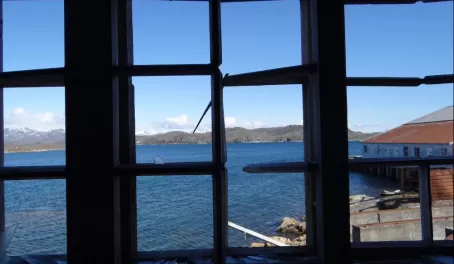 View from window of abandoned fishing village in Greenland
