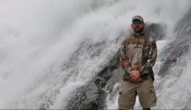 Cody at waterfall by Mendenhall Glacier