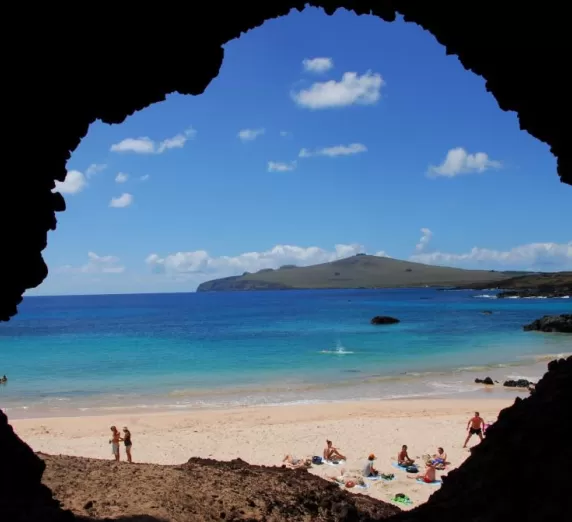 Relax along the sunny beaches of Easter Island's coast