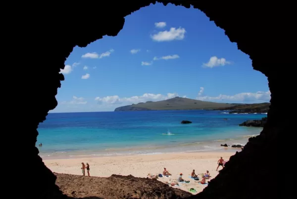 Relax along the sunny beaches of Easter Island's coast