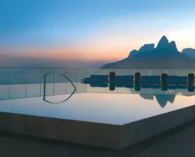Catch the last rays of sun from the pool at Experience exceptional cuisine at Hotel Fasano Al Mare
