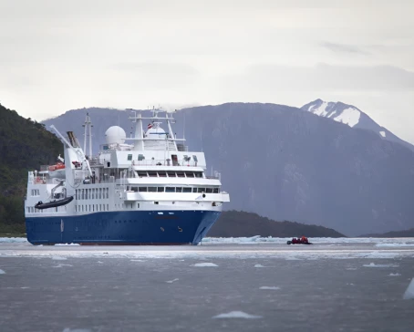MV Discoverer sailing across vast seas