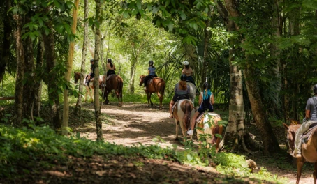 Horseback riding through the jungle at the Lodge at Chaa Creek