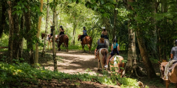 Horseback riding through the jungle at the Lodge at Chaa Creek